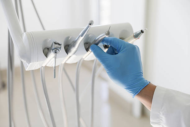 Professional Tooth Extraction technician working in Scottsburg, IN